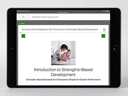 Digital kit displayed on device, featuring the Introduction to Strengths-Based Development page.