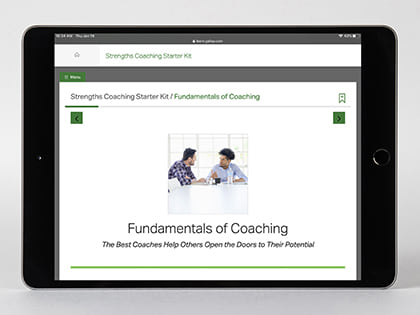 Digital kit displayed on device, featuring the Fundamentals of Coaching page.