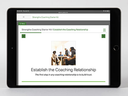 Digital kit displayed on device, featuring the Establish the Coaching Relationship page.