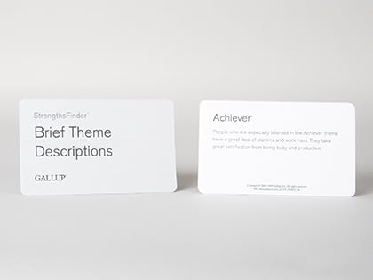 Front and back of a CliftonStrengths Brief Theme Definitions Card.